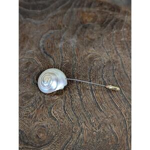 1970's ornate turbo shell tie pin brooch
